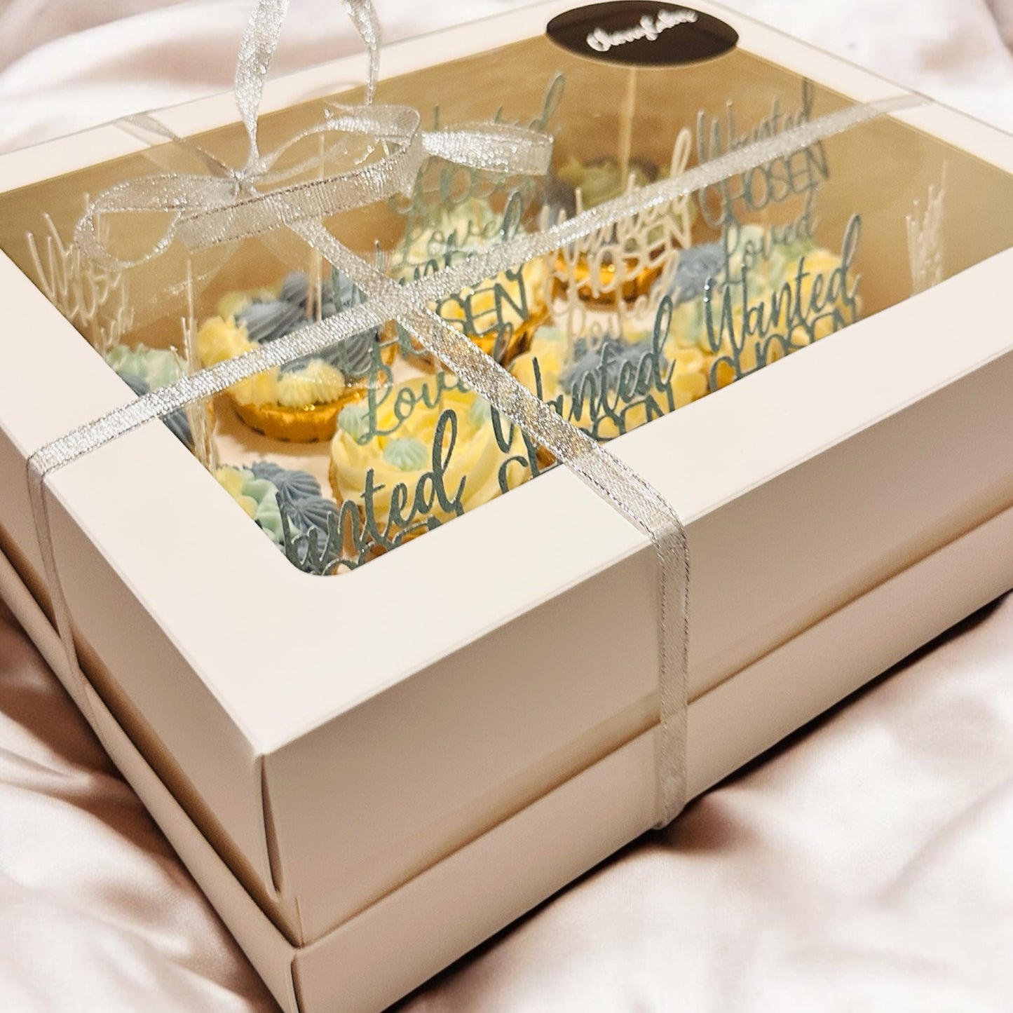 Bespoke 12 blue/white cupcakes