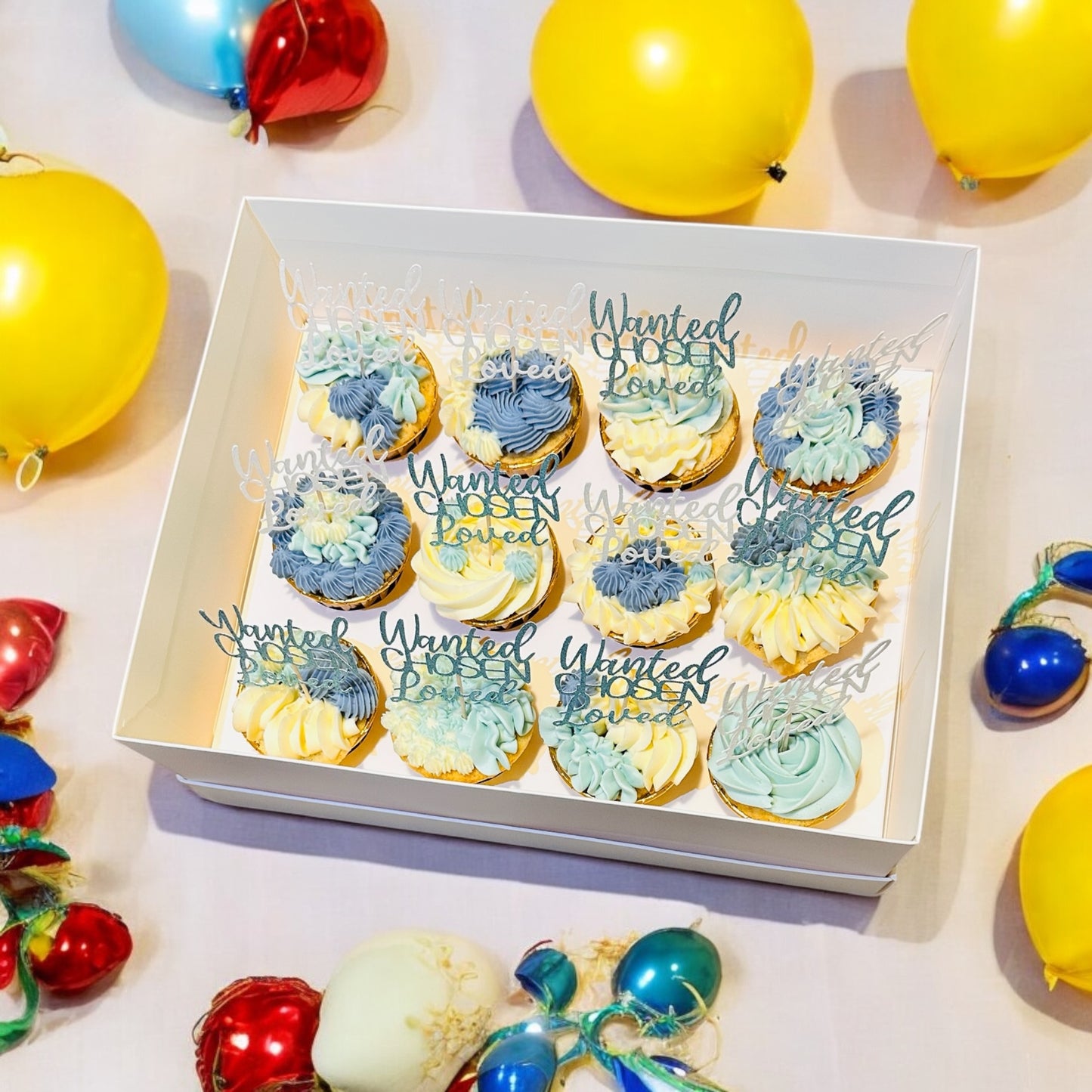 Bespoke 12 blue/white cupcakes